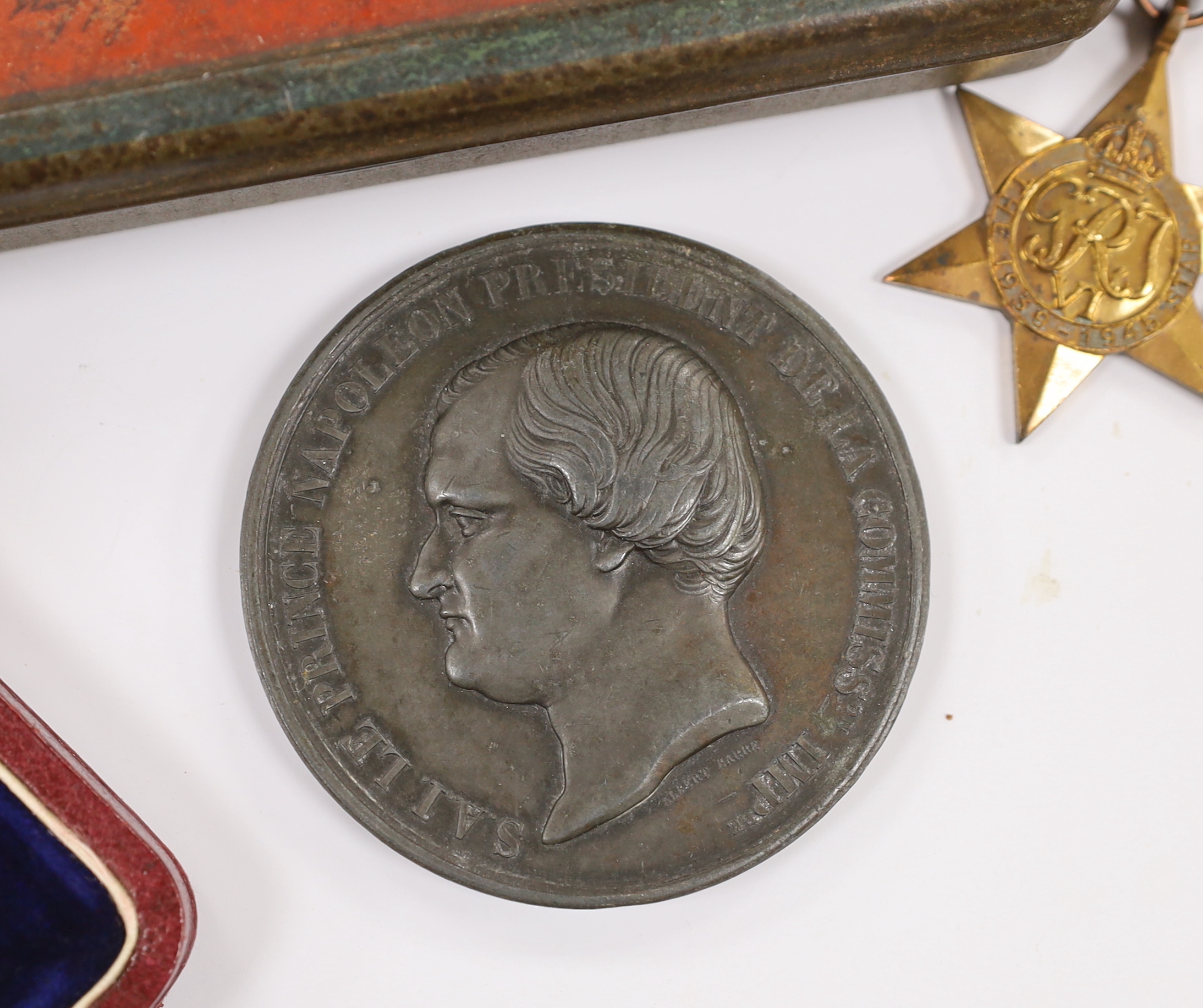 A WWII medal group comprising The Burma Star, The 1939-1945 Star, The Defence medal and The War medal, a cased 1870 Republique Francaise medal, a Victoria Golden Jubilee medallion, an 1855 Napoleon medallion, a Polish Cr